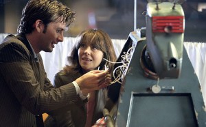 The Doctor and Sarah Jane fixing K-9