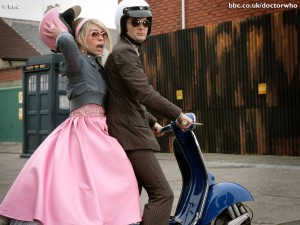 The Doctor and Rose on their motorbike decked out in 50's costumes