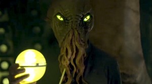 The Ood holding his communicator while in the TARDIS