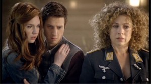 Rory, Amy and River watch the Doctor dying